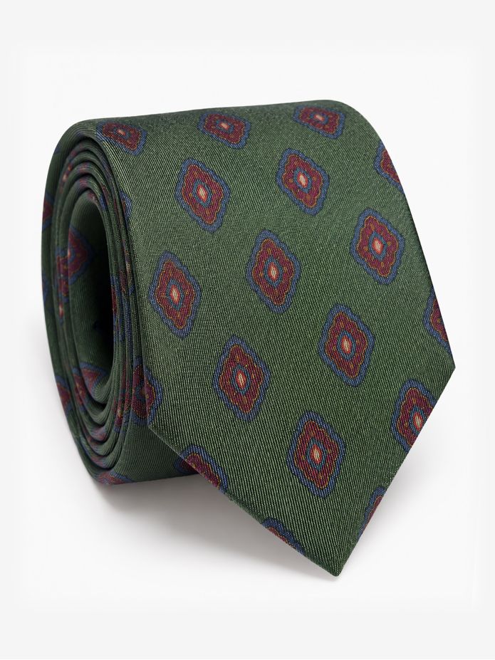 Green silk tie with retro motifs