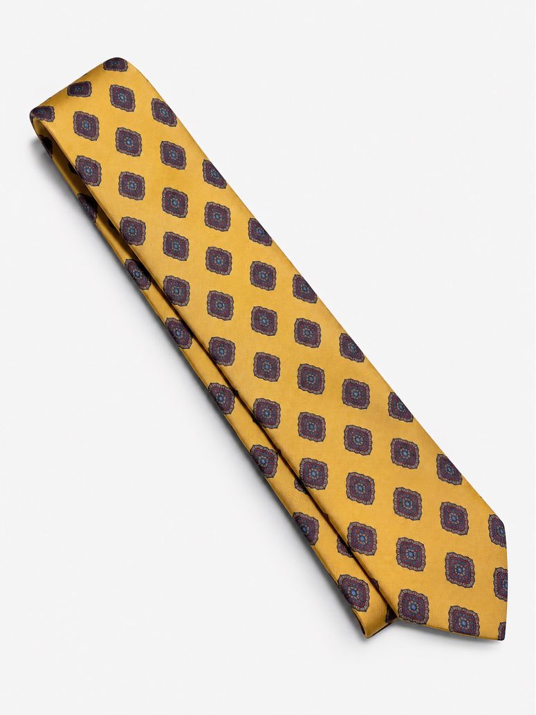 Yellow silk tie with retro patterns