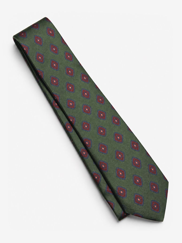 Green silk tie with retro motifs