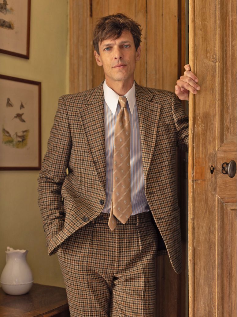Beige silk tie with coat of arms patterns