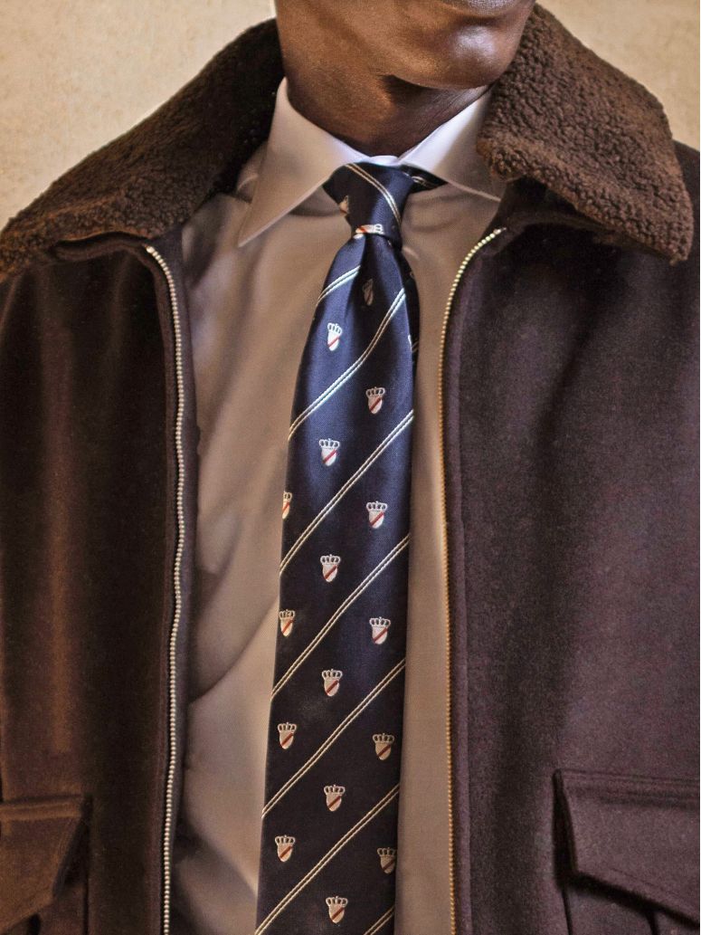 Navy silk tie with coat of arms motifs