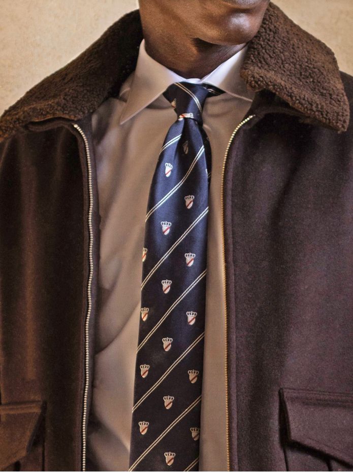 Navy silk tie with coat of arms motifs