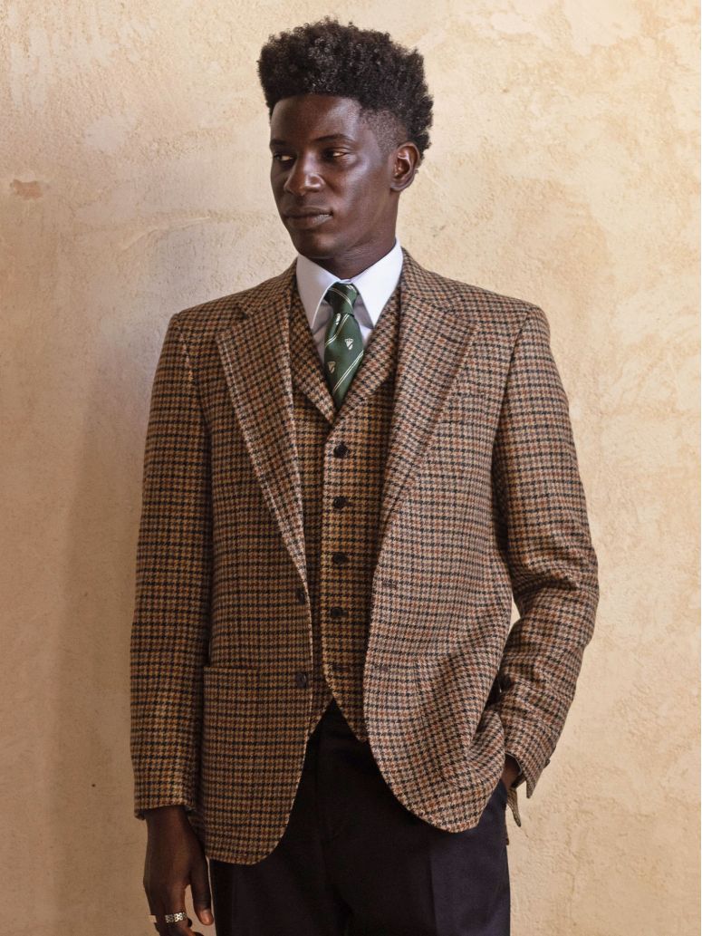 Green silk tie with coat of arms motifs