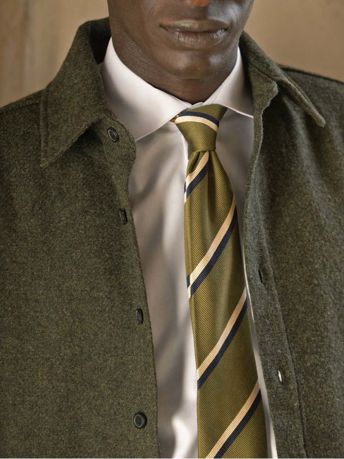 Green silk club tie with navy and cream stripes