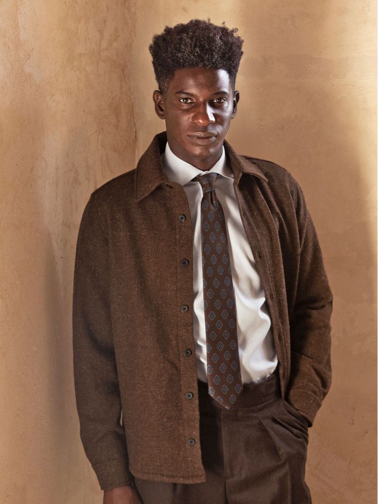 Brown silk tie with retro patterns